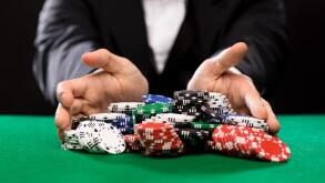 poker player with chips at casino table