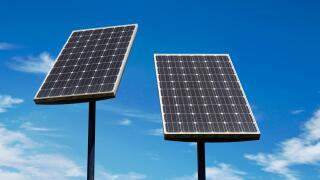 Small Solar Panels Against a Blue Sky