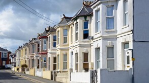 A street of terraced houses with bay windows, saltash, cornwall, uk