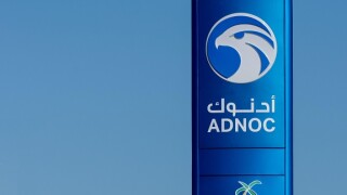 "Ras al Khaimah, RAK/United Arab Emirates - 12/22/2019: Adnoc Gas Station blue sign a petrol gas station in the Middle East."