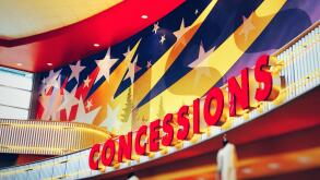 Concessions sign in mega screen movie theater in US