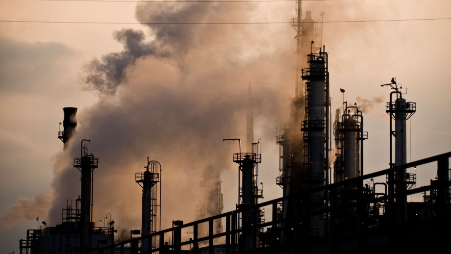 Oil and gas refinery smokestacks