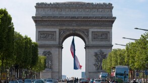 the Arc de Triomphe in Paris as viewed from the champs elysees