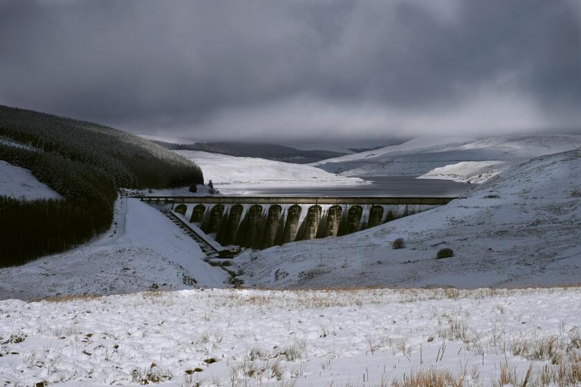 The Statkraft Reservoir (dam) Nant y Moch in the winter landscape