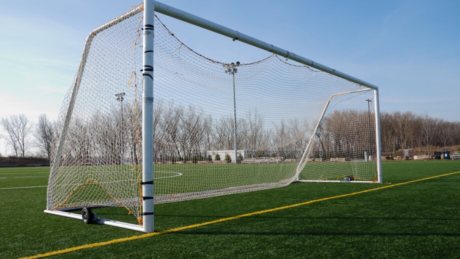Wheeled mobile goalposts and net on a soccer pitch in Toronto Ontario Canada
