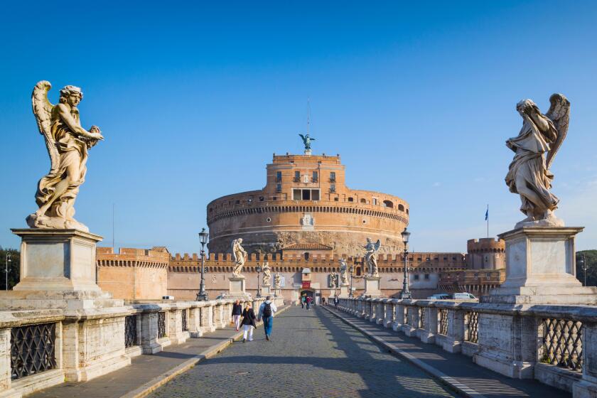 Rome, Italy. Looking across Ponte Sant'Angelo to Castel Sant'Angelo