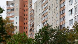High-rise apartment buildings in a residential neighborhood showcasing rental and mortgage opportunities as autumn approaches