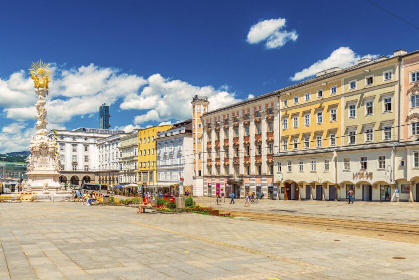 Linz - June 2020, Austria: View of the main square of Linz with colorful buildings in the traditional architectural style