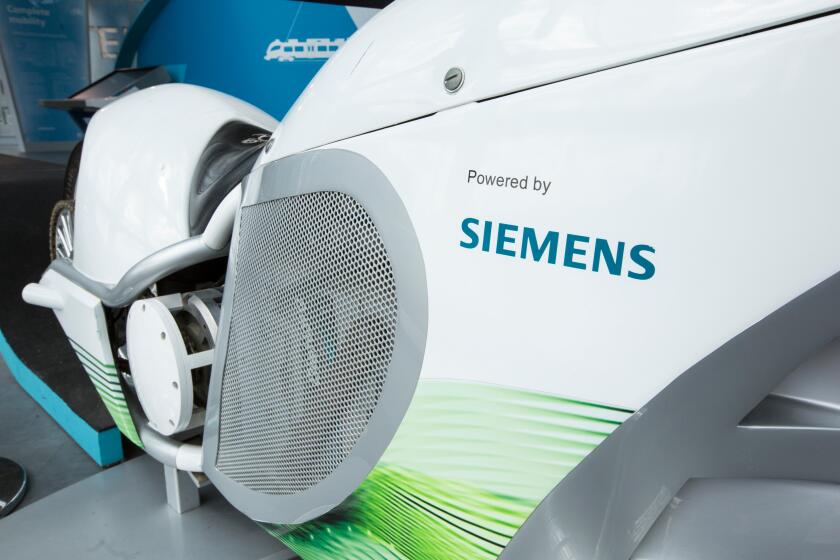 An electric motorbike as part of a sustainability exhibition at the Crystal building which is the first building in the world to be awarded an outstanding BREEAM (BRE Environmental Assessment Method) rating and a LEED (Leadership in Energy and Environment