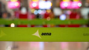 Madrid, Spain. 10th Apr, 2025. The Aena logo, the state-owned airport service management company, is visible on a barrier tape in the departure hall of Adolfo Suarez Madrid-Barajas Terminal 4 in Spain. (Photo by Xavi Lopez/SOPA Images/Sipa USA) Credit: Si