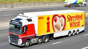 Nestle Shredded Wheat advert articulated trailer food chain logistics distribution hgv truck lorry fuels of different kinds driving along UK motorway