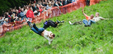 Rollover risk in action at the Cheese Rolling Festival, Cooper's Hill, Gloucestershire, UK