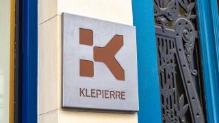 Sign and logo at the entrance to the headquarters of Klepierre, a French investment trust specializing in management and development of shopping malls