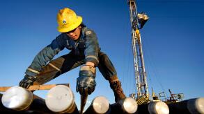 Argentina, Neuquem province, Coutral Co, oil field, men at work, the village is located in the desert, it was founded in 1933