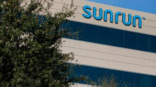 A logo sign outside of a facility occupied by Sunrun in Scottsdale, Arizona, on February 4, 2018.