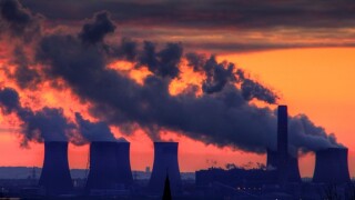 Fiddlers Ferry Power station shown at sunset from Warrington and the village of Stockton Heath - in use before March 2020