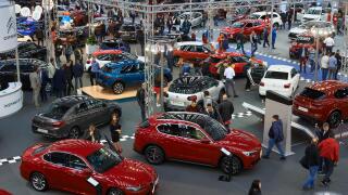 Belgrade, Serbia - March 22, 2018: People looking at cars exhibited on Belgrade car show