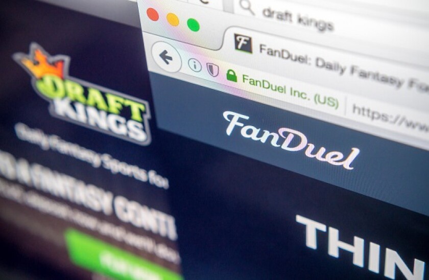 The websites of the fantasy sports sites DraftKings and FanDuel are seen on a computer screen on Tuesday, June 14, 2016. DraftKings and FanDuel are reported to be discussing a merger agreement. (© Richard B. Levine)