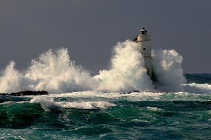 Lighthouse in storm from alamy 230x150