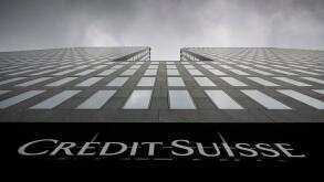 FILE - Grey clouds cover the sky over a building of the Credit Suisse bank in Zurich, Switzerland, Feb. 21, 2022. Swiss regulators have found that Credit Suisse made a ?serious breach? of law in connection with a now-bankrupt firm linked to Australian fin
