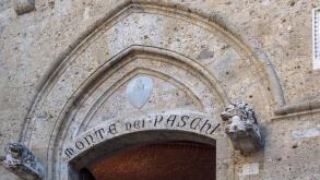 SIENA,  ITALY - AUGUST 05, 2015:  Signage above Banca Monte dei Paschi in Piazza Salimbeni