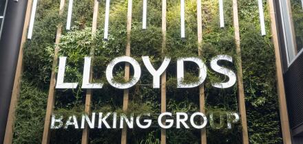 LLOYDS Banking Group brand name mounted on a decorative artificial living wall inside the company?s London head office - sustainable, modern design