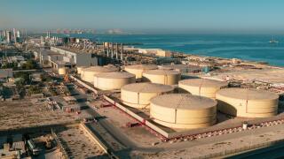 Middle East water and gas containers along the coastline for gas, water and oil concepts. Industrial zone.