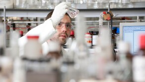 male laboratory technician working in lab