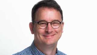 Simon Headshot landscape.jpg