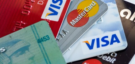 Arranged photos of various U.S. credit cards from Visa, MasterCard and American Express