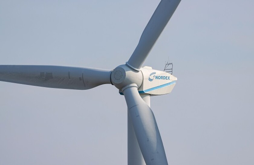 Nordex wind turbine against blue sky