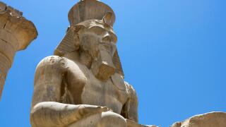 Ramses II. Seated Colossus of Ramesses II in the Colonnade of Amenophis III, Luxor Temple, Luxor, Nile Valley, Egypt