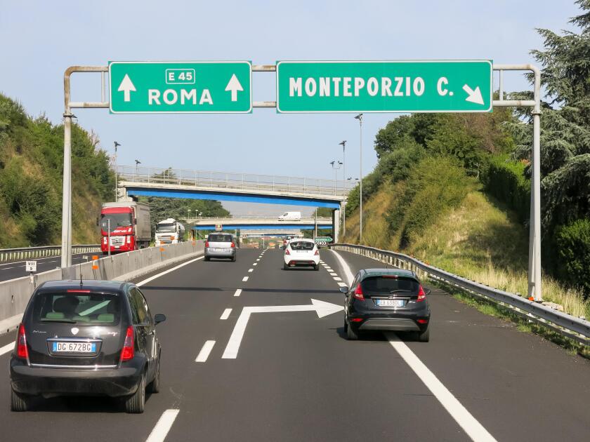 Traffic on Italian Autostrada (highway, motorway) near Rome in Lazio, Italy