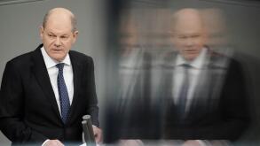 FILE - Germany's Chancellor Olaf Scholz makes a government statement in the Bundestag, Berlin, Wednesday, Dec. 13, 2023. German Chancellor Olaf Scholz is calling for calm and a readiness to accept compromises as the country faces protests by farmers angry