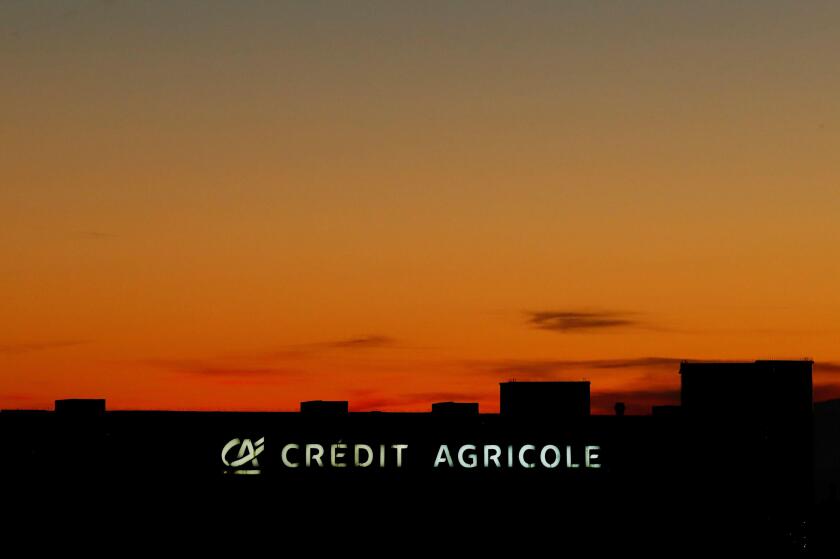 The logo of Credit Agricole is seen on a bank branch in Lausanne, Switzerland, October 16, 2017. REUTERS/Denis Balibouse