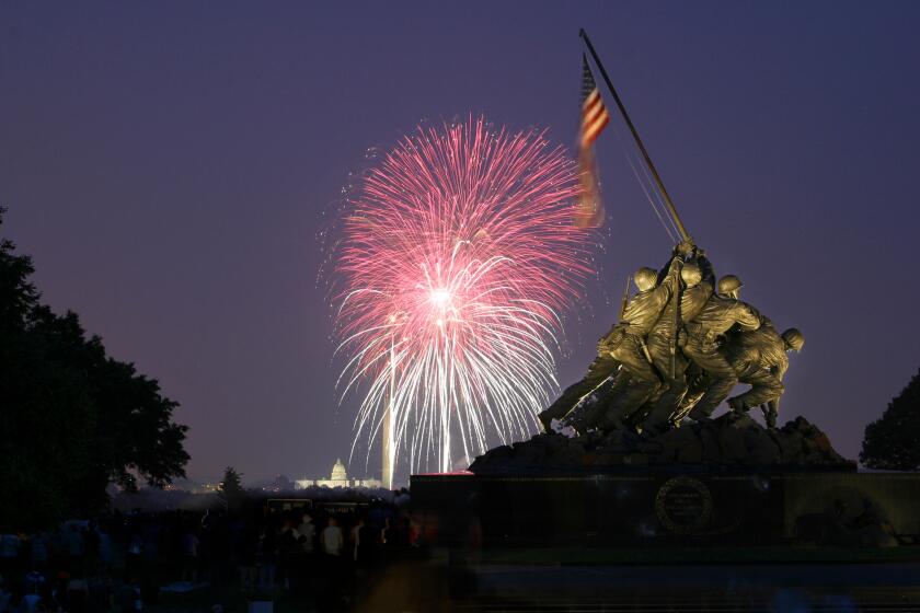 USA, District of Columbia, Washington DC, July 4 Fireworks Behind the Iwo Jima Memorial