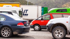 Cars, trucks and motorhomes lined up at Picton docks, waiting for the Wellington ferry.