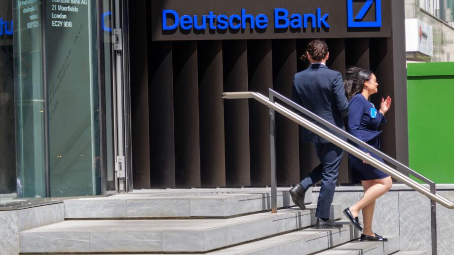 People descend the steps from the Deutsche Bank headquarters in Moorgate, London, UK ? a major financial institution located in the heart of the City of London?s banking district.