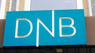 Trondheim, Norway - September 26, 2015: Close-up of the sign at the DNB office entrance. DNB is a Norwegian financial services group.