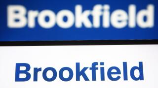 Ukraine. 09th Aug, 2021. In this photo illustration a Brookfield Asset Management logo is seen on a smartphone and a pc screen. (Photo by Pavlo Gonchar/SOPA Images/Sipa USA) Credit: Sipa USA/Alamy Live News