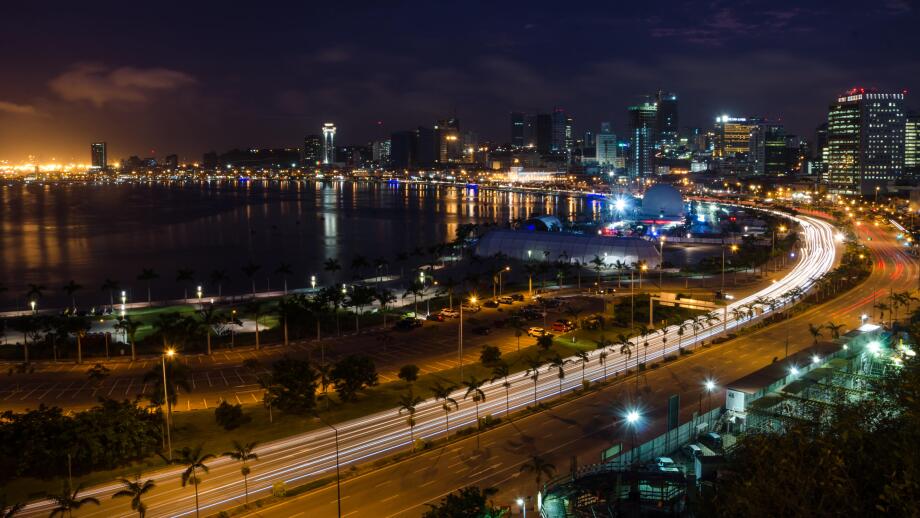 Skyline of capital city Luanda and its seaside during the night, Angola, Africa