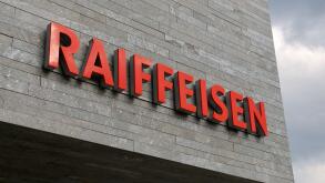 Wohlen, Aargau, Switzerland - 15th April 2021 : Swiss Raiffeisen bank sign on a concrete facade in Wohlen. Raiffeisen is a Swiss cooperative bank, the