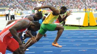 Jamaican Usain Bolt (R) makes a false start at the men?s 100m semi final at the 12th IAAF World Championships in Athletics in Berlin, Germany, 16 August 2009. Photo: HANNIBAL