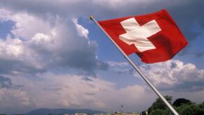 Swiss flag and Lake Geneva, Geneva, Switzerland