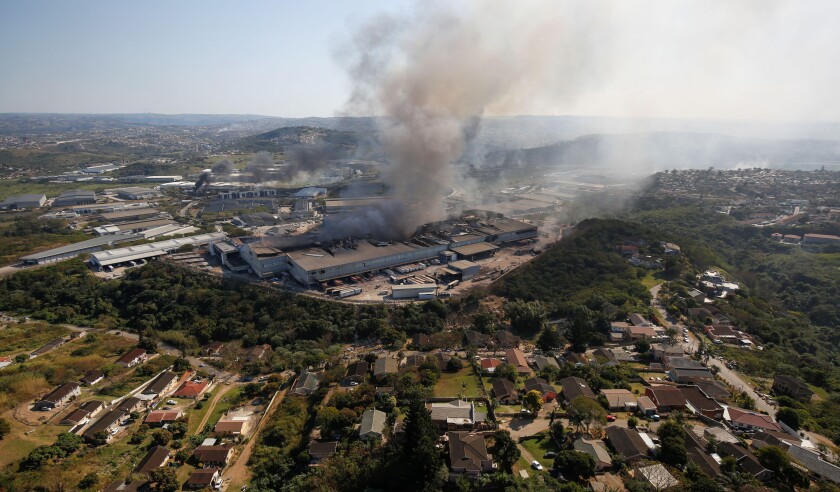 A general view of the burning warehouse after violence erupted following the jailing of former South African President Jacob Zuma, in Durban, South Africa, July 14, 2021. REUTERS/Rogan Ward