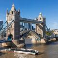 England, London, Tower Bridge with Uber Boat on River Thames