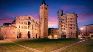 Parma, Italy. Cityscape image of old town Parma, Italy at beautiful autumn sunrise.