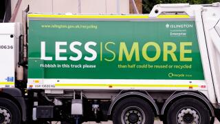 Waste Vehicle with recylcing slogan printed on the side in an effort to get people to recycle, London Borough of Islington, UK