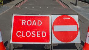 London, UK. 10th June, 2017. The market remains closed and the flag flies at half mast. But tourists still fill the London Bridge area - some pause for thought and others have left flowers. The market is still sealed off for investigation one week on. Lon
