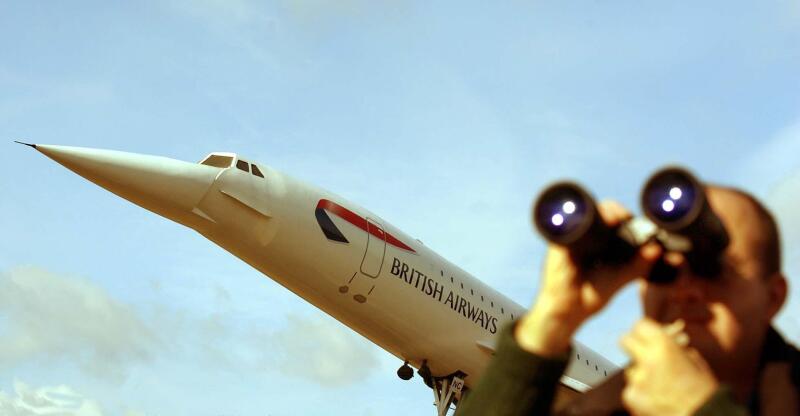 A keen plane spotter at the stands under the model of Concorde at Heathrow, London terminal awaiting the arrival of the final Concorde flight arriving at Heathrow airport, from New York, marking the end of an era of supersonic travel. * The big bird, pack
